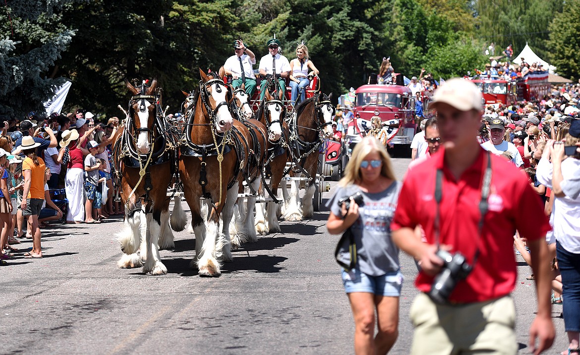 BRENDA AHEARN | Daily Inter Lake file photo
The Budweiser Clydesdales make their way down Grand Avenue during the Bigfork Fourth of July Parade on Tuesday afternoon, July 4, 2017.