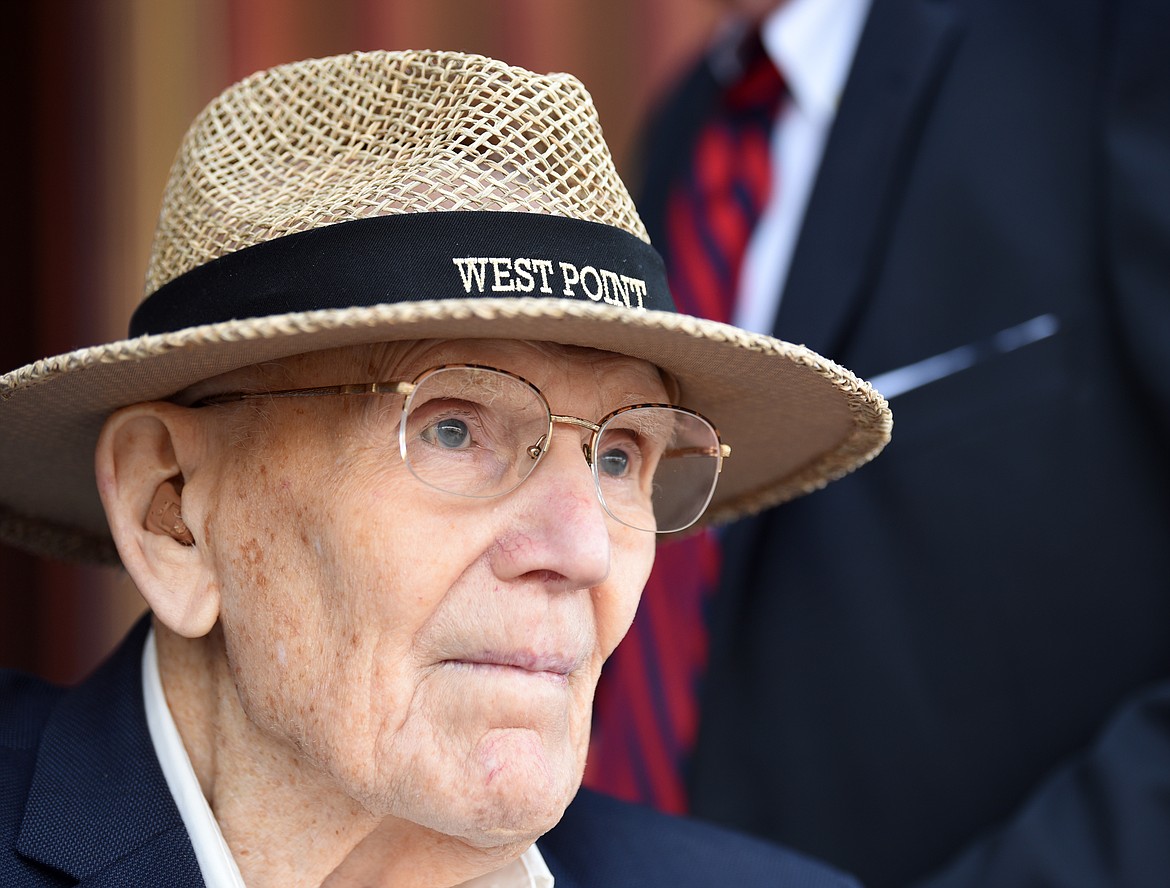 Ret. Maj. Gen. Neil Van Sickle looks up from the hangar at the Wings of Freedom bombers in Kalispell. Van Sickle flew the B-17s and the B-24s during World War II. (Brenda Ahearn/Daily Inter Lake FILE)