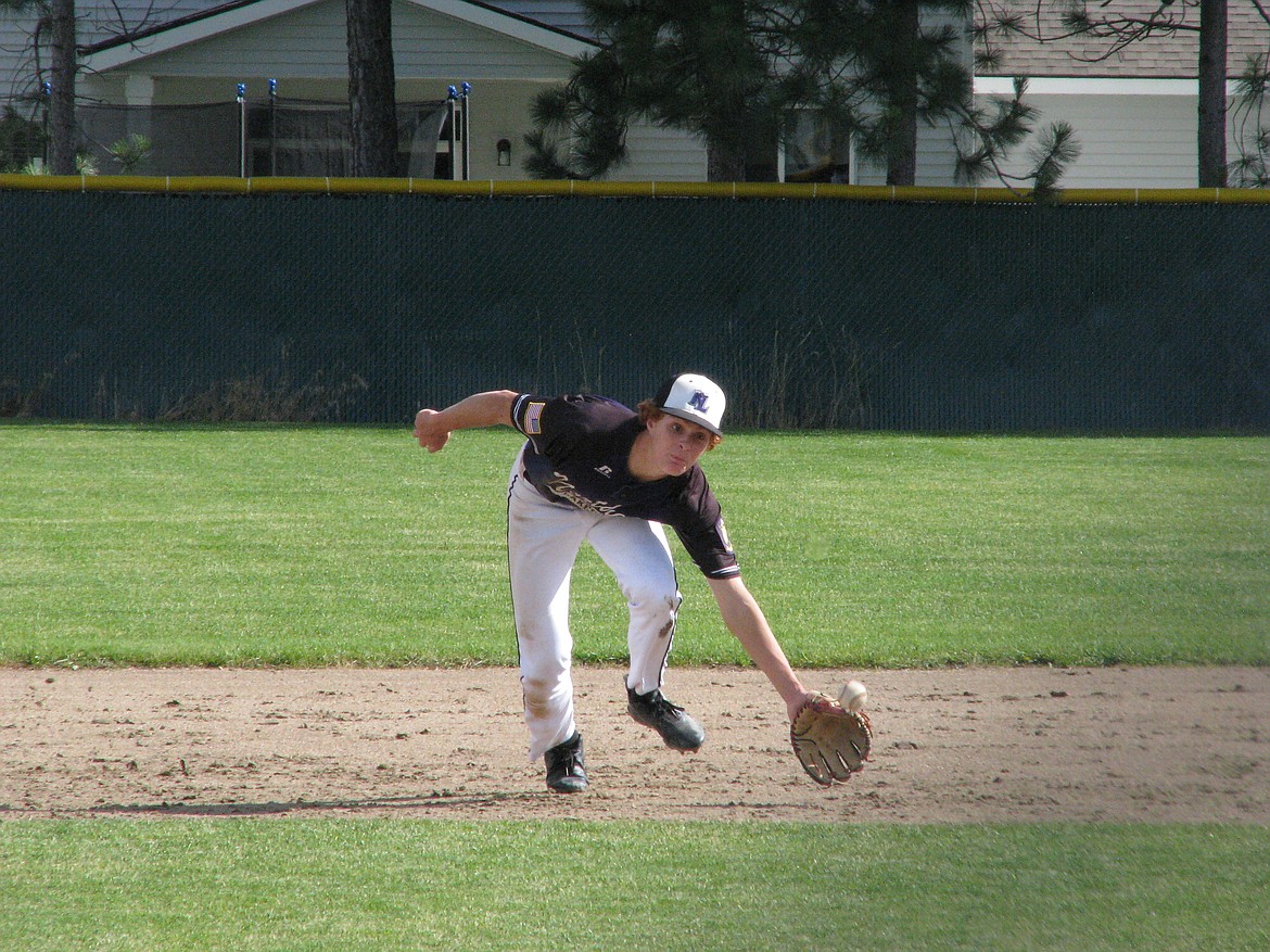 Northern Lakes third baseman Sam Pemberton snags a ground ball on the short hop in the first game of Tuesday’s doubleheader vs. Prairie at Lakeland High.