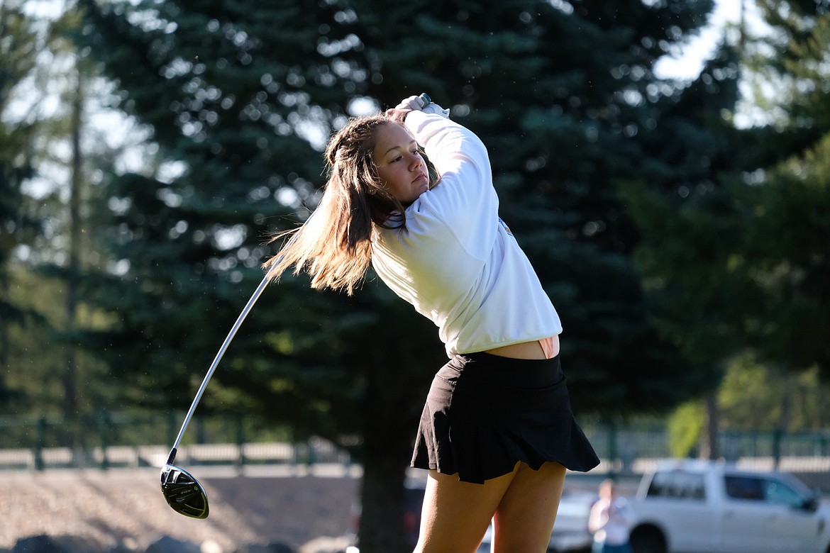 Chloe Tanner tees off on day two of the Whitefish Lake Golf Club’s Fourth of July Tournament on Friday. (Daniel McKay/Whitefish Pilot)