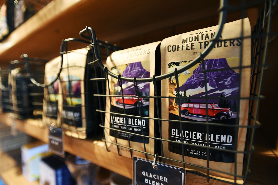 Bags of Glacier Blend whole bean coffee on display at the Montana Coffee Traders Mercantile.