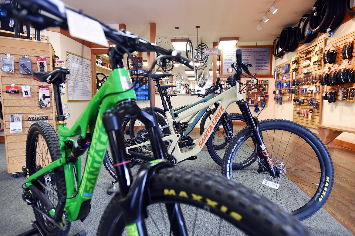 A selection of Santa Cruz full suspension bikes on the floor at Glacier Cyclery & Nordic in Whitefish on Friday, July 10. (Casey Kreider/Daily Inter Lake)