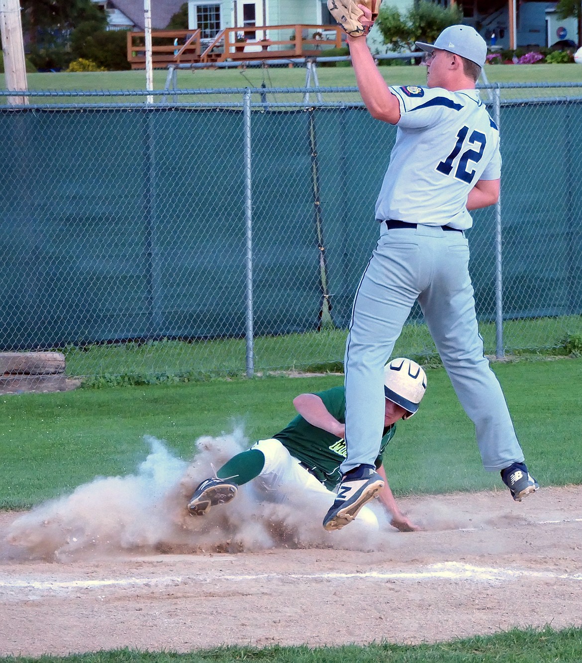 Mission Valley Mariners Eric Dolence slides home for a run in a game verses the Missoula Mavericks on Monday, July 13. (Whitney England/Lake County Leader)