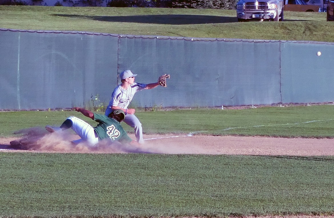 Mission Valley Mariners Jesse Littleboy slides safely onto third base in a game verses the Missoula Mavericks on Monday, July 13. (Whitney England/Lake County Leader)