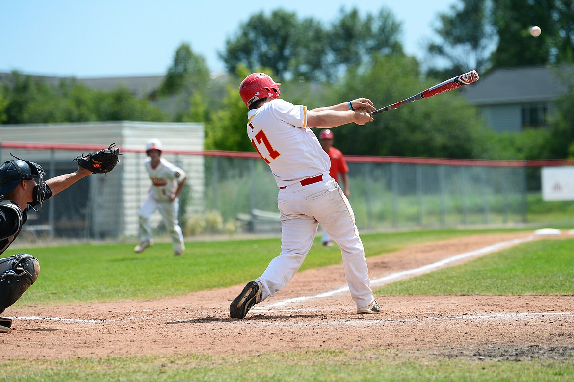 Kalispell Lakers AA’s Hayden Vaughn connects on a two-run single in the bottom of the fifth inning against Belgrade at Griffin Field on Thursday, July 16. (Casey Kreider/Daily Inter Lake)