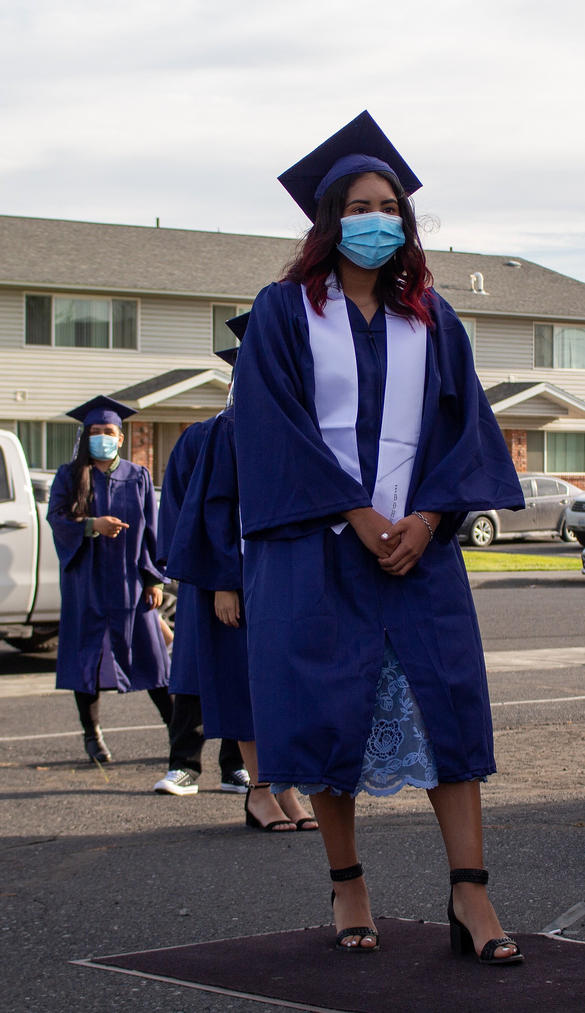 Casey McCarthy/The Sun Tribune
Amy Prieto and her fellow 2020 Desert Oasis High School graduates wait patiently for their chance to cross the stage and receive their diploma at the school’s graduation celebration last Thursday.