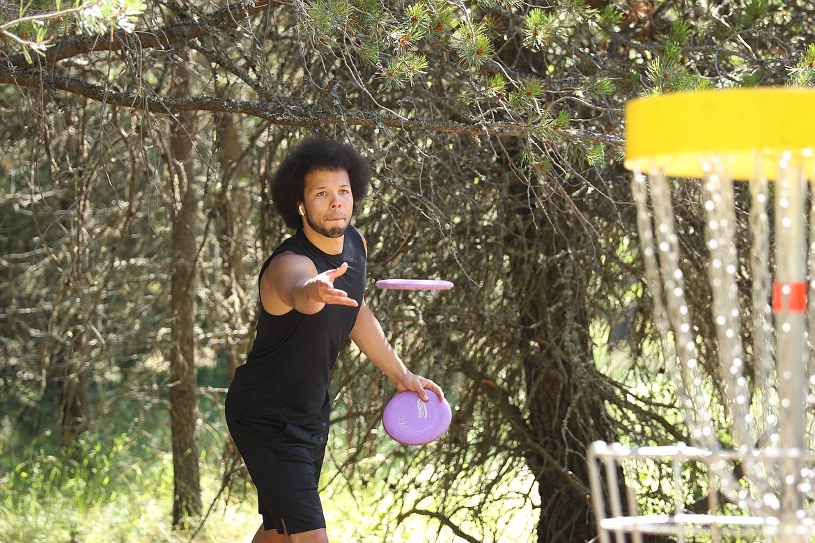 GERRY McCRAY/Special to Hagadone News Network 
 Zachary Drinkall tosses a disc in the first round of Saturday’s Project Northstar tournament at Farragut State Park. Drinkall, an intermediate partipant, shot +8 (62) in the first round.