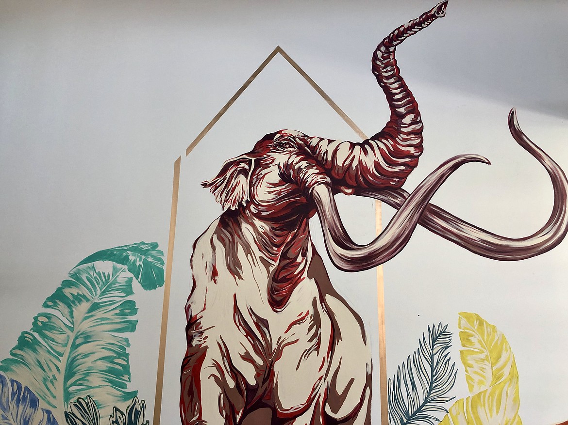 When complete, Erika Kovalenko’s mural of a Columbian mammoth adorns one wall of the classroom at Moses Lake Museum & Art Center.