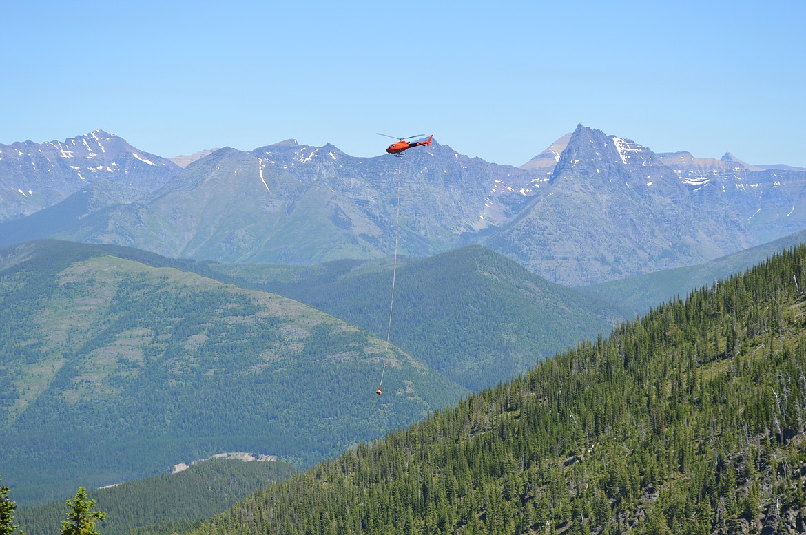 A helicopter airlifts weather station materials and equipment to Tunnel Ridge on the Flathead National Forest near Essex. (Photo provided by Friends of Flathead Avalanche Center)