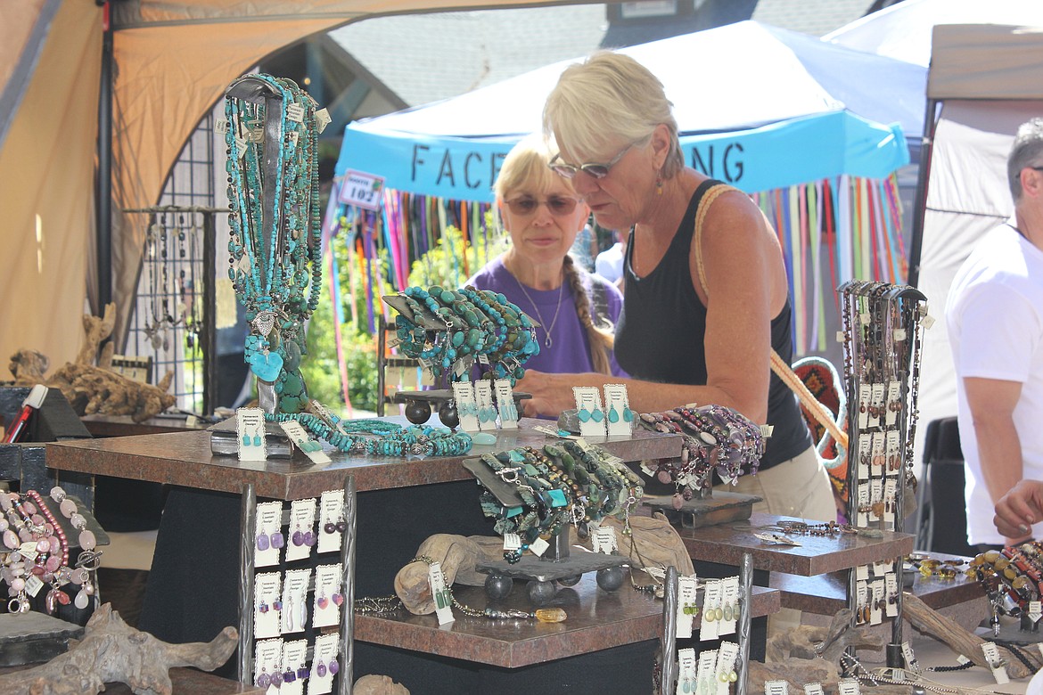 Courtesy Bigfork Area Chamber of Commerce
Customers browse a display of turquoise jewelry during the Bigfork Festival of the Arts.