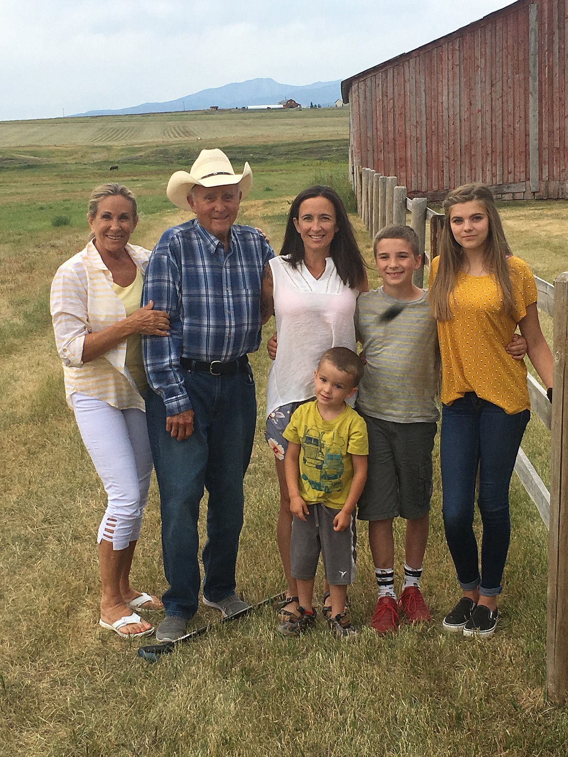 From left, are Sandy and David Mirisch, daughter Summer and their three 
 grandchildren - Madeline, Brydon and Bridger, on their land in Superior. (Photo courtesy David Mirisch)