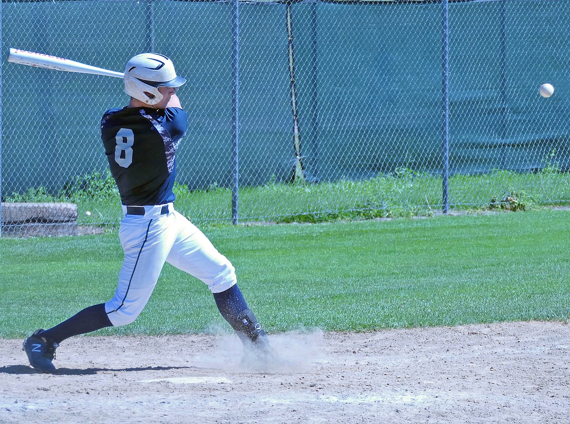 Mission Valley’s Eric Dolence records a single RBI in a game against the Glacier Twins on Saturday, July 25. (Whitney England/Lake County Leader)