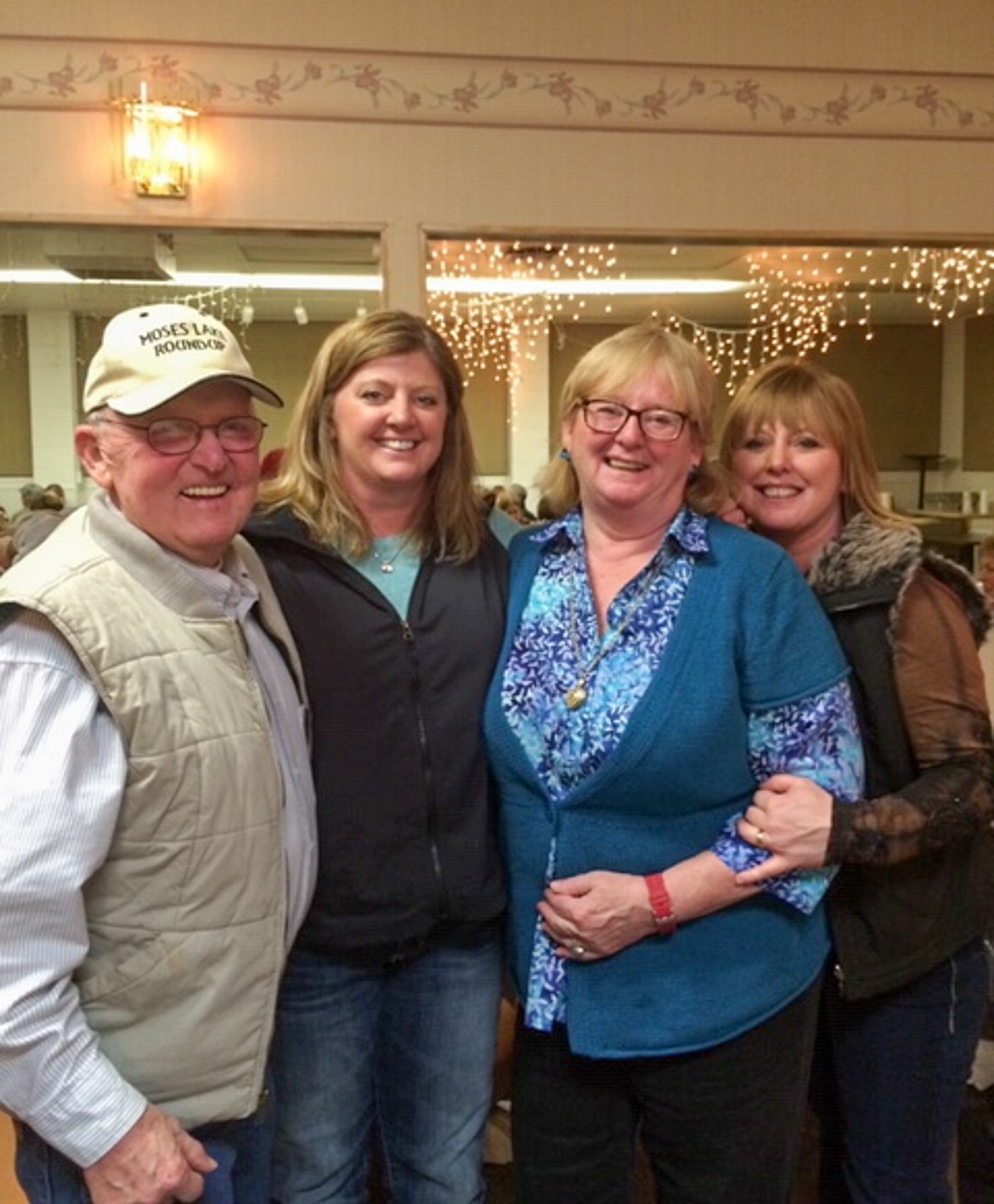 Left to right: Roger Edwards, Kelly Raap, Gaynor Edwards,and Stacey Dowton gather together for a family photo in 2014.