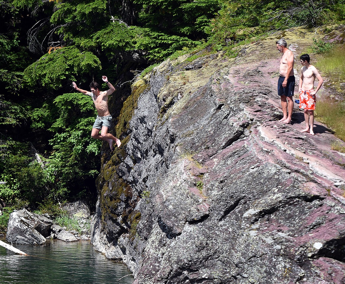 A man jumps into McDonald Creek in Glacier National Park July 23. The creek is a favored place for summer visitors trying to beat the heat, but it has also been the sight of several drowning deaths over the years. (Jeremy Weber/Daily Inter Lake)