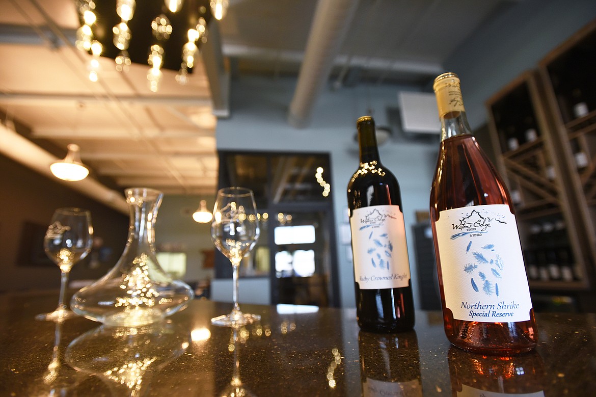 A pair of wines, Ruby Crowned Kinglet, a red, and Northern Shrike Special Reserve, a white, on display at Waters Edge Winery & Bistro in Evergreen on Thursday, July 30. (Casey Kreider/Daily Inter Lake)