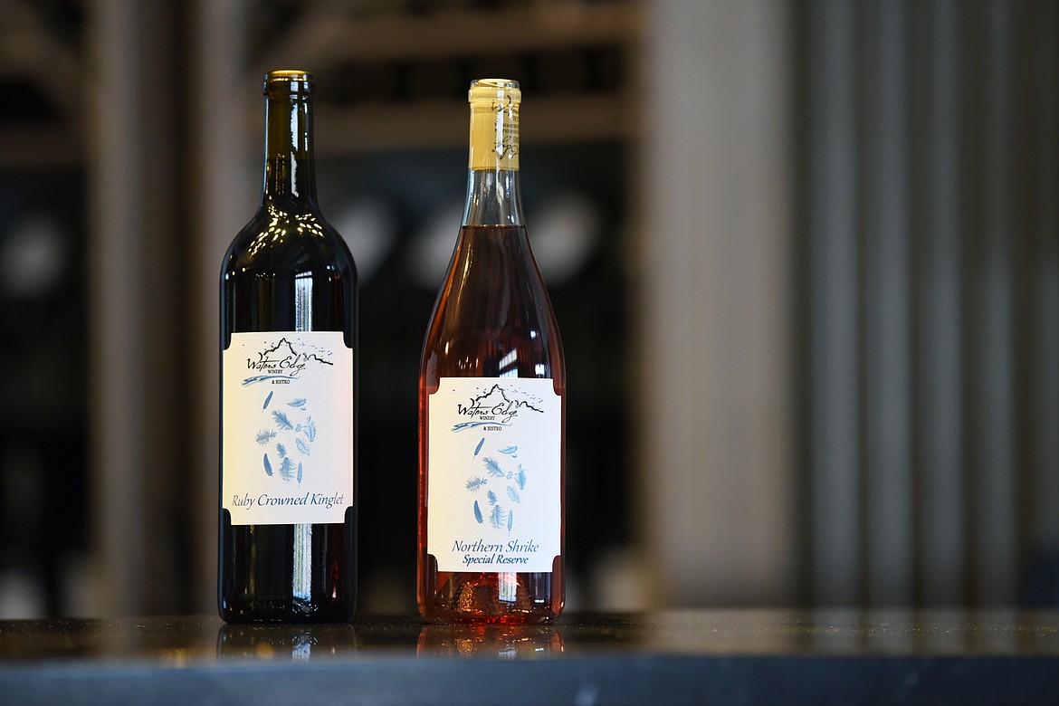 A pair of wines, Ruby Crowned Kinglet, a red, and Northern Shrike Special Reserve, a white, on display at Waters Edge Winery & Bistro in Evergreen on Thursday, July 30. (Casey Kreider/Daily Inter Lake)