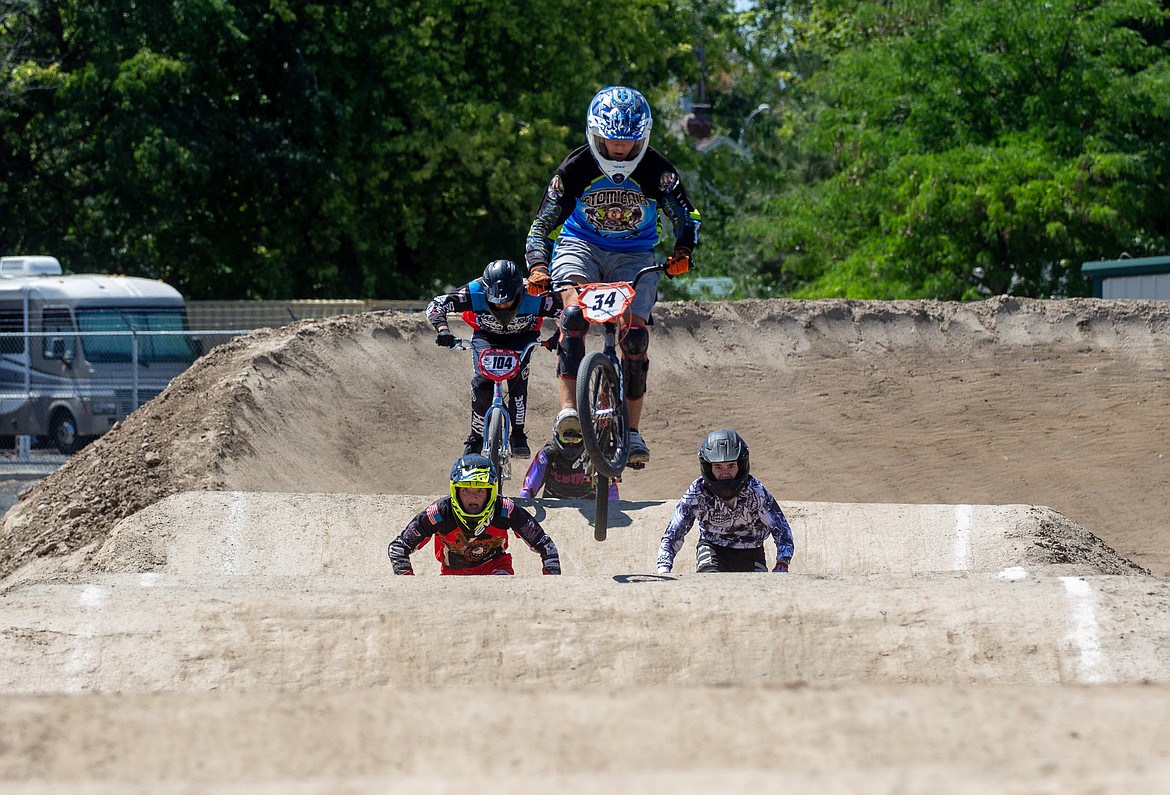 Bikes dip up and down on the dirt ramps of the Moses Lake BMX track on Sunday afternoon as riders came out for the single-point race event, hosted by Moses Lake BMX.