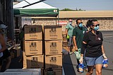A chance to give back: Trout Lake Farm holds food distribution