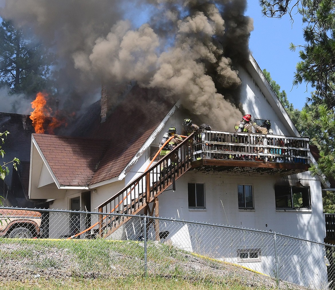 Columbia Falls  firefighters battle an apartment fire Sunday afternoon.