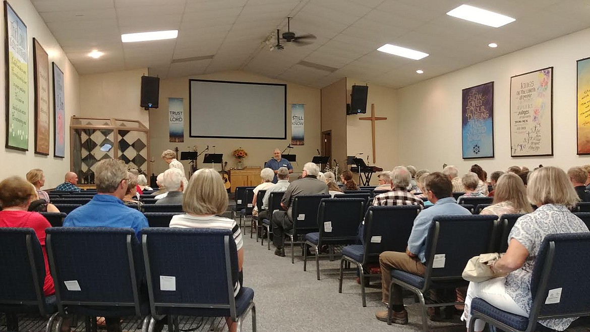 Plains Alliance Church pastor Randy Neilson speaks to the congregation during its 50th anniversary service. (Chuck Bandel/Valley Press)