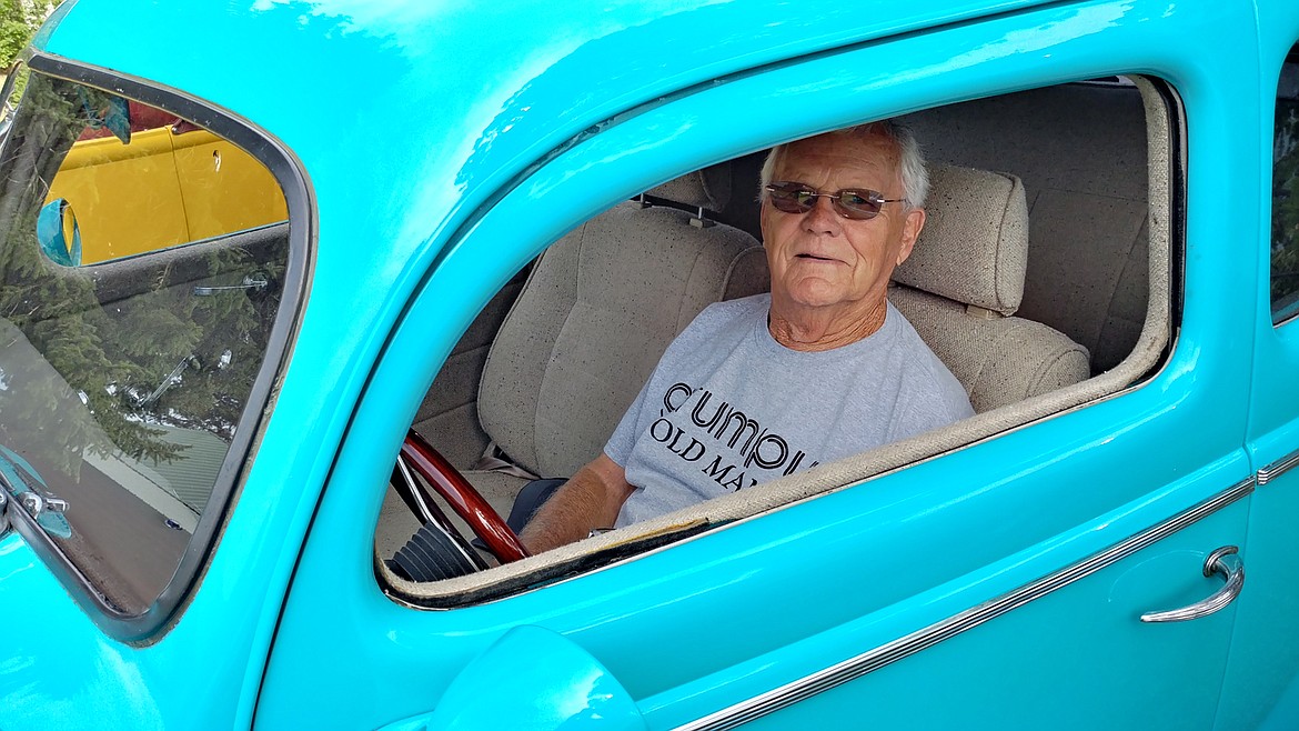 Roger Barnes in his 1940 Ford 2-door Deluxe at the 20th annual Trout Creek car show. (Chuck Bandel/Valley Press)