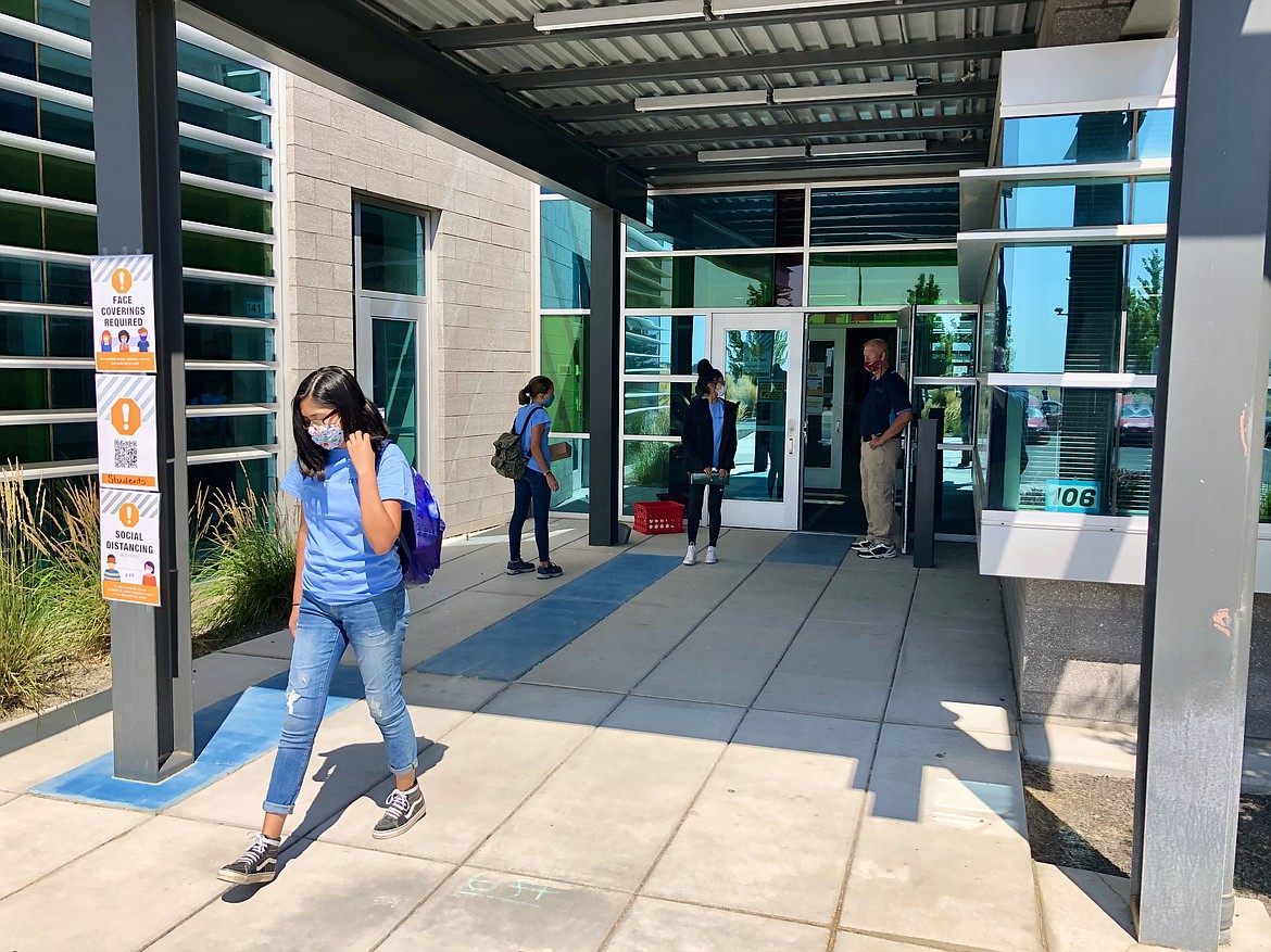 Students leave the Columbia Basin Technical Skills Center on Tuesday after morning classes. CBTech is holding two weeks of summer school in part to test distance and hygiene protocols as the return to classes for the fall semester looms.