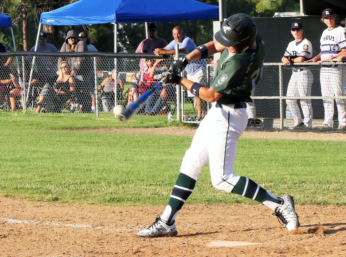 Mariners' Dawson Dumont makes contact with the ball for a single against the Missoula Mavericks during the Class A Legion Baseball Western District Tournament on Thursday, July 30 in Florence. (Whitney England/Lake County Leader)