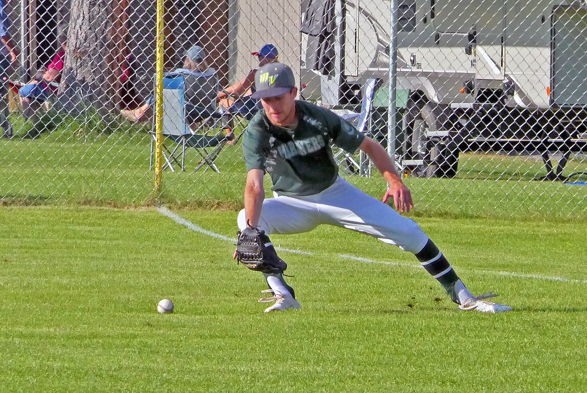 Mariners’ Keyan Dalbey fields a ball in right field against the Missoula Mavericks during the Class A Legion Baseball Western District Tournament on Thursday, July 30 in Florence. (Whitney England/Lake County Leader)
