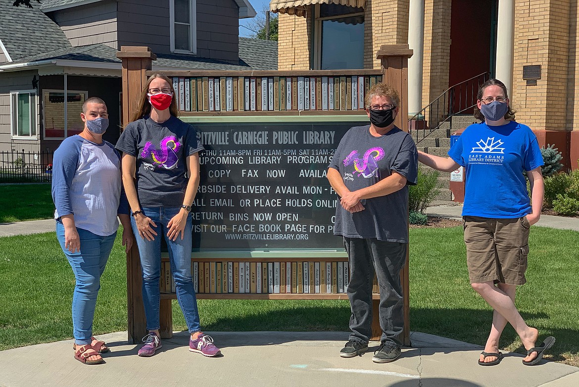 Ritzville employees of the East Adams Library District, left to right, Amy Hille, East Adams Library Director Kylie Fullmer, Heidi Harting and Millie Hopkins have worked this summer to adjust their business strategy in order to continue to serve the community from behind closed doors.