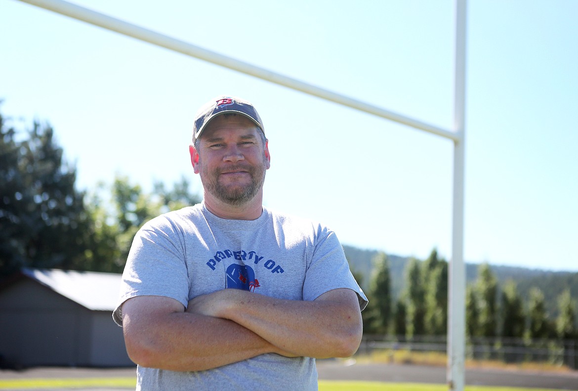 Bigfork's new head football coach Jim Benn is pictured on the field at Bigfork High School Monday afternoon.