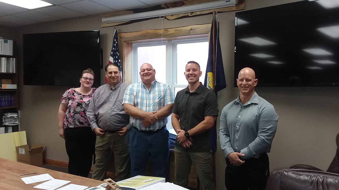 Here are the new Mineral County Sheriff’s Office employees. From left, are, communications officer Tabatha Dunlap, Sheriff Mike Toth, Undersheriff Wayne Campman, deputies Shawn Visintin and Ethan Atkin. (Monte Turner/Mineral Independent)