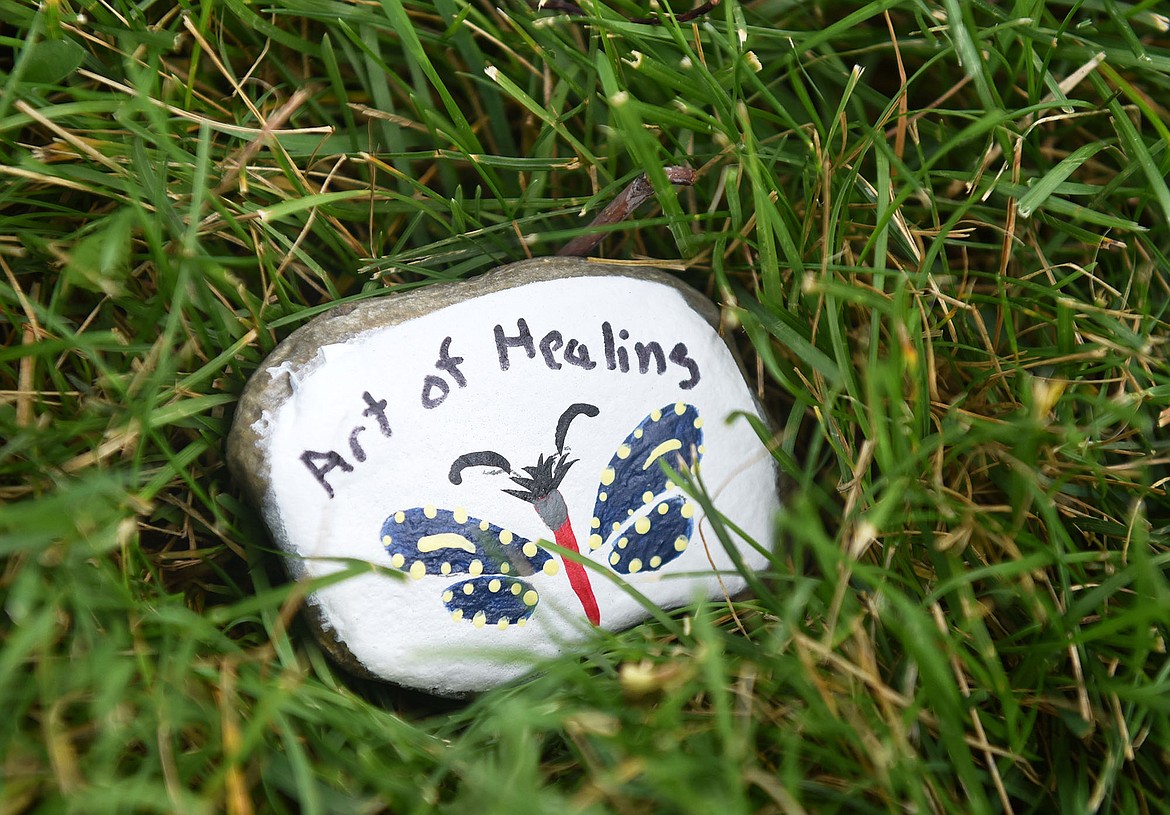 Painted rocks are hidden throughout town in a joint effort between the Stumptown Art Studio and Flathead Cancer Aid Services to raise awareness about their nonprofit organizations. Folks are encouraged to find the rocks and post a photo of the rock on the project’s Facebook page called “Art of Healing WF.” (Heidi Desch/Whitefish Pilot)