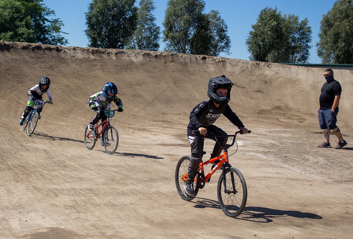 Casey McCarthy/Columbia Basin Herald
Jaxon Reese, 9, front, chases down the first-place rider on Saturday. Reese and his father came down to check out the event, before eventually deciding to give it a shot, finishing second.
