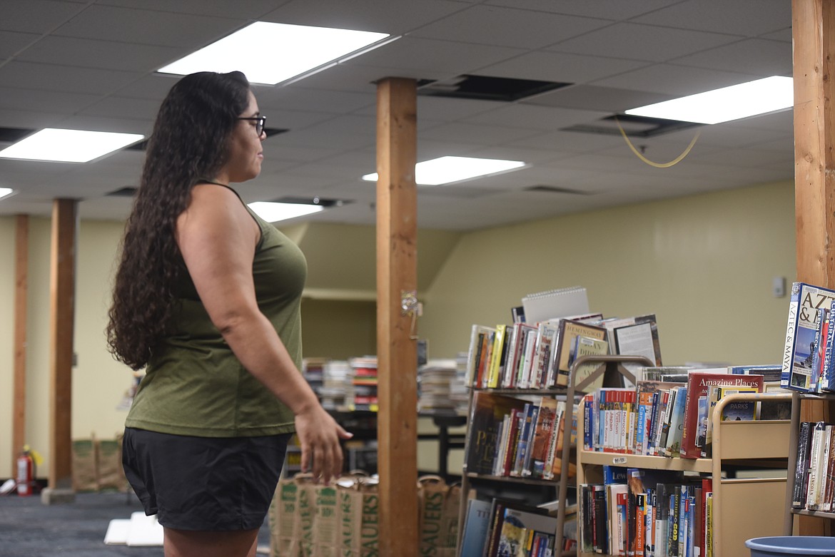 Lincoln County Library Director Alyssa Ramirez looks over the basement of the Libby Branch. While the first floor reopens this week, officials do not expect work on the lower level to be completed until September. (Will Langhorne/The Western News)