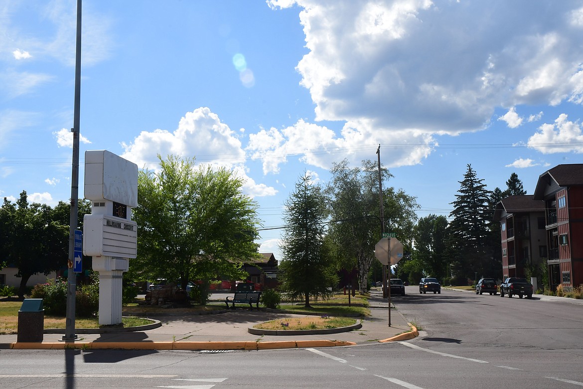 The old teller drive-through building and the small section of green space on the north side of the old First Citizens Bank will be replaced by a three-story residential building that will house two commercial spaces facing Nucleus Ave. (Teresa Byrd/Hungry Horse News)