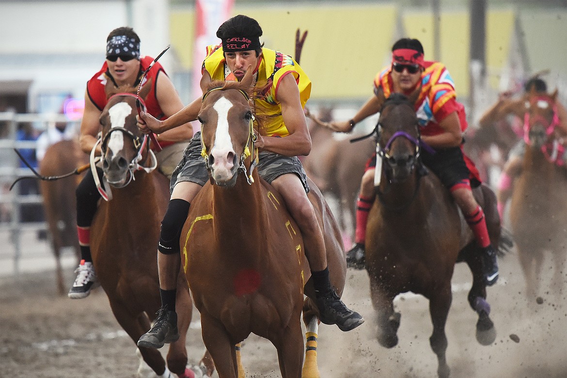 Competitors race in the Indian Relay Races at the Northwest Montana Fair & Rodeo on Thursday, Aug. 20. (Casey Kreider/Daily Inter Lake)