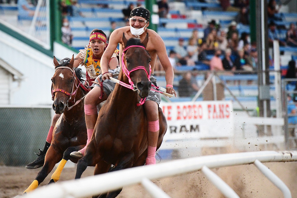 Competitors race in the Indian Relay Races at the Northwest Montana Fair & Rodeo on Thursday, Aug. 20. (Casey Kreider/Daily Inter Lake)