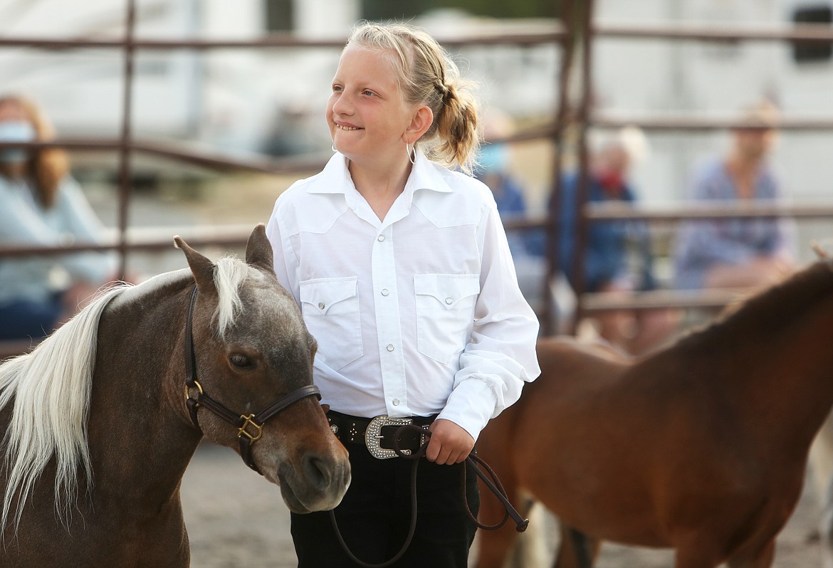 Lily Sutton, 10, and Bet participate the showmanship class of the mini horse show at the Northwest Montana Fair the morning of Aug. 20. (Mackenzie Reiss/Daily Inter Lake)