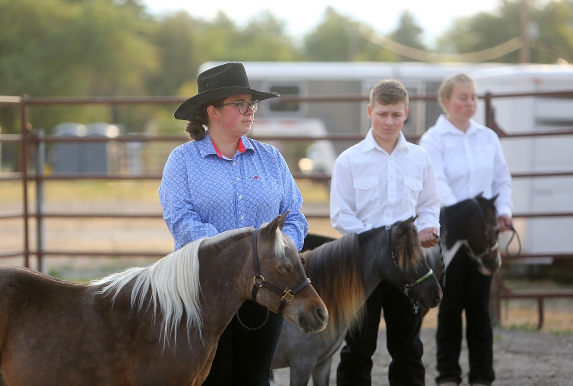 Maddie Sutton, of Kalispell, awaits instruction from a judge during the mini horse show at the Northern Stars Arena on Thursday. (Mackenzie Reiss/Daily Inter Lake)