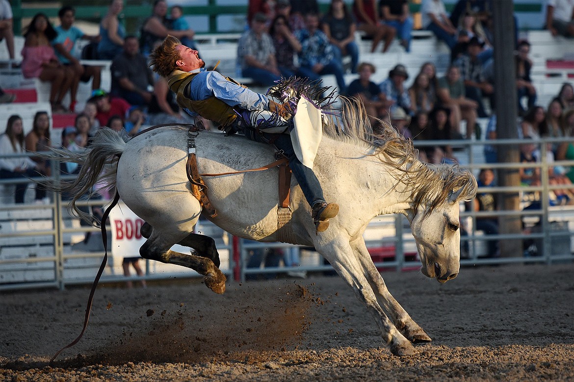 Dalton May, from Kalispell, rides Justified during bareback riding at the Northwest Montana Fair & Rodeo on Friday, Aug. 21. (Casey Kreider/Daily Inter Lake)