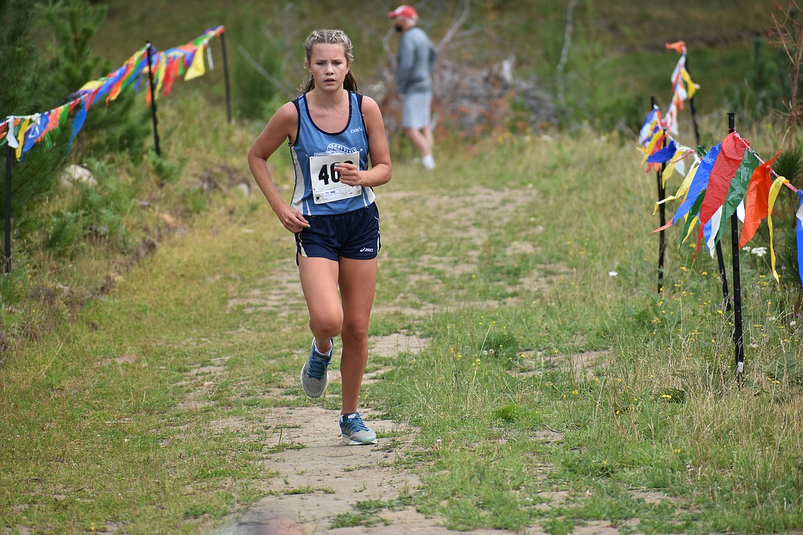 DYLAN GREENE/Bonner County Daily Bee
Timberlake’s Sarah Zerfas nears the finish line in a dual meet at Sandpoint on Friday morning.