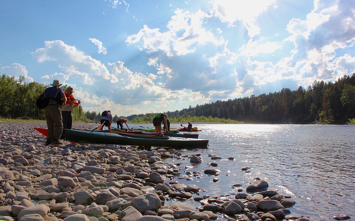 Representatives from non-profit organizations and state agencies kayaked a portion the Flathead River Wednesday to explore the Bad Rock Canyon Conservation Project area. (Kianna Gardner/Daily Inter Lake)