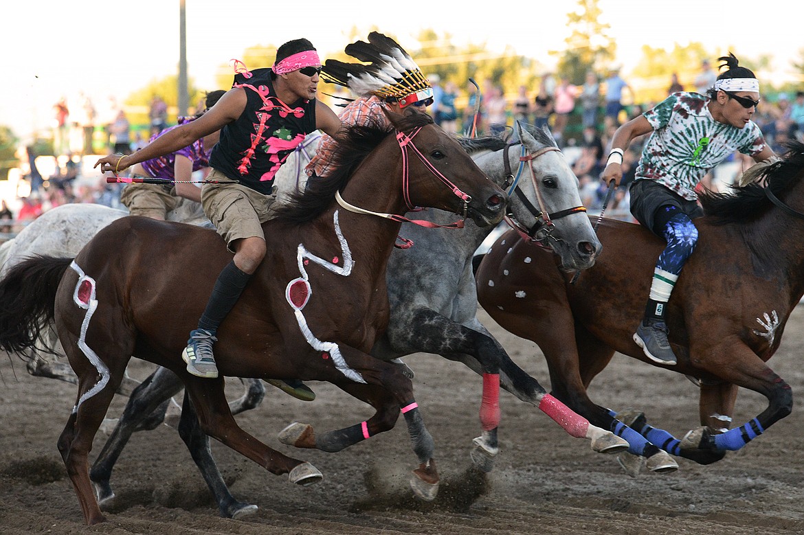 Riders compete in the Indian Relay Races at the Northwest Montana Fair & Rodeo on Saturday, Aug. 22. (Casey Kreider/Daily Inter Lake)