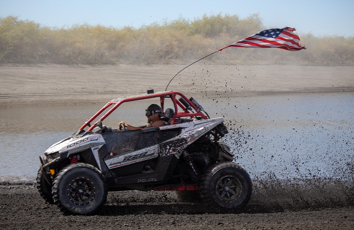 Casey McCarthy/Columbia Basin Herald
Jack Hurt flies around the track at the Off Road Race Around the Bowls on Saturday afternoon, the Sand Scorpions ORV Group’s first major event of the summer.