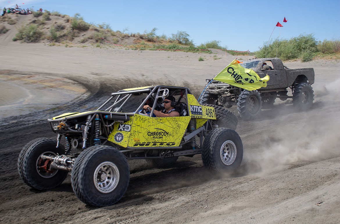 Anthony Arreola, left, takes off from the starting line with Justin Gilbert behind at the Off Road Race Around the Bowls outside Moses Lake on Saturday.