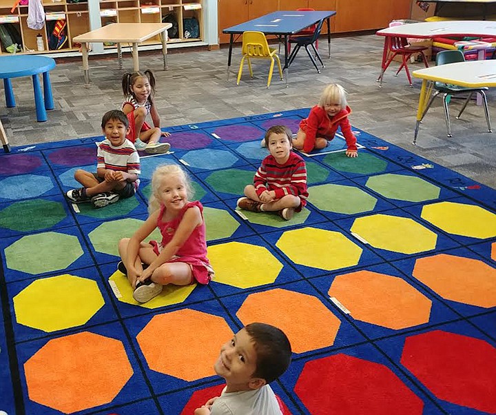 Dixon School kindergarten students enjoy their first day in class last Thursday. (Chuck Bandel/Valley Press)