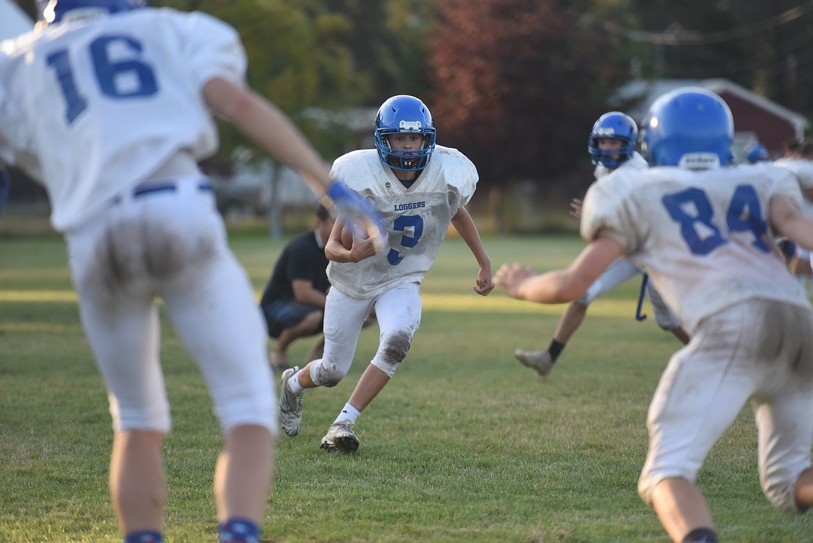 The Libby Loggers are set to start the football season with a game against Whitefish on Aug. 28. Coach Neil Fuller says the Loggers will feature an offense balance between the air and the ground. (Will Langhorne/The Western News)