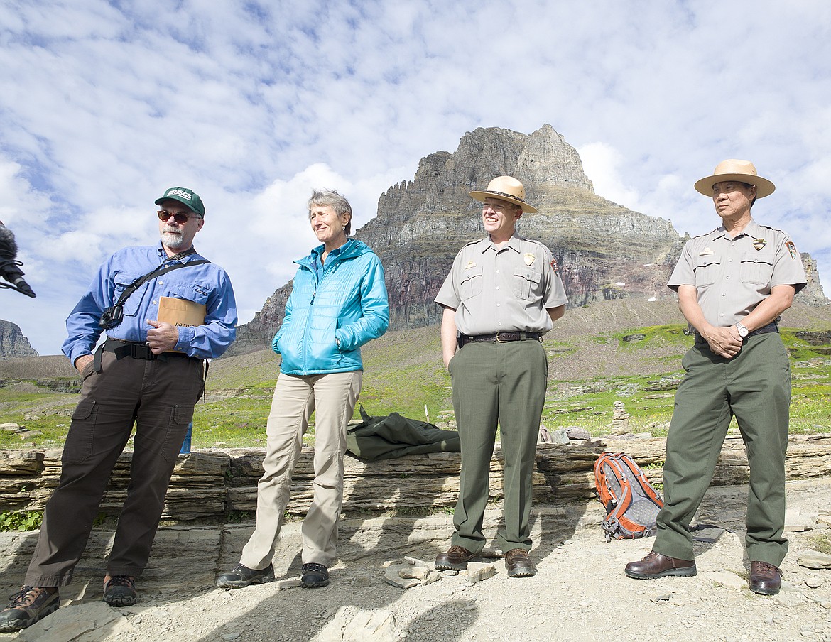 In this 2016 photo, U.S. Geological Survey Scientist Dan Fagre, left, stands with former Secretary of Interior Sally Jewell, Glacier Deputy Superintendent Eric Smith and Glacier Superintendent Jeff Mow on the Hidden Lake Trail at Logan Pass in Glacier National Park. (Chris Peterson/Hungry Horse News FILE)