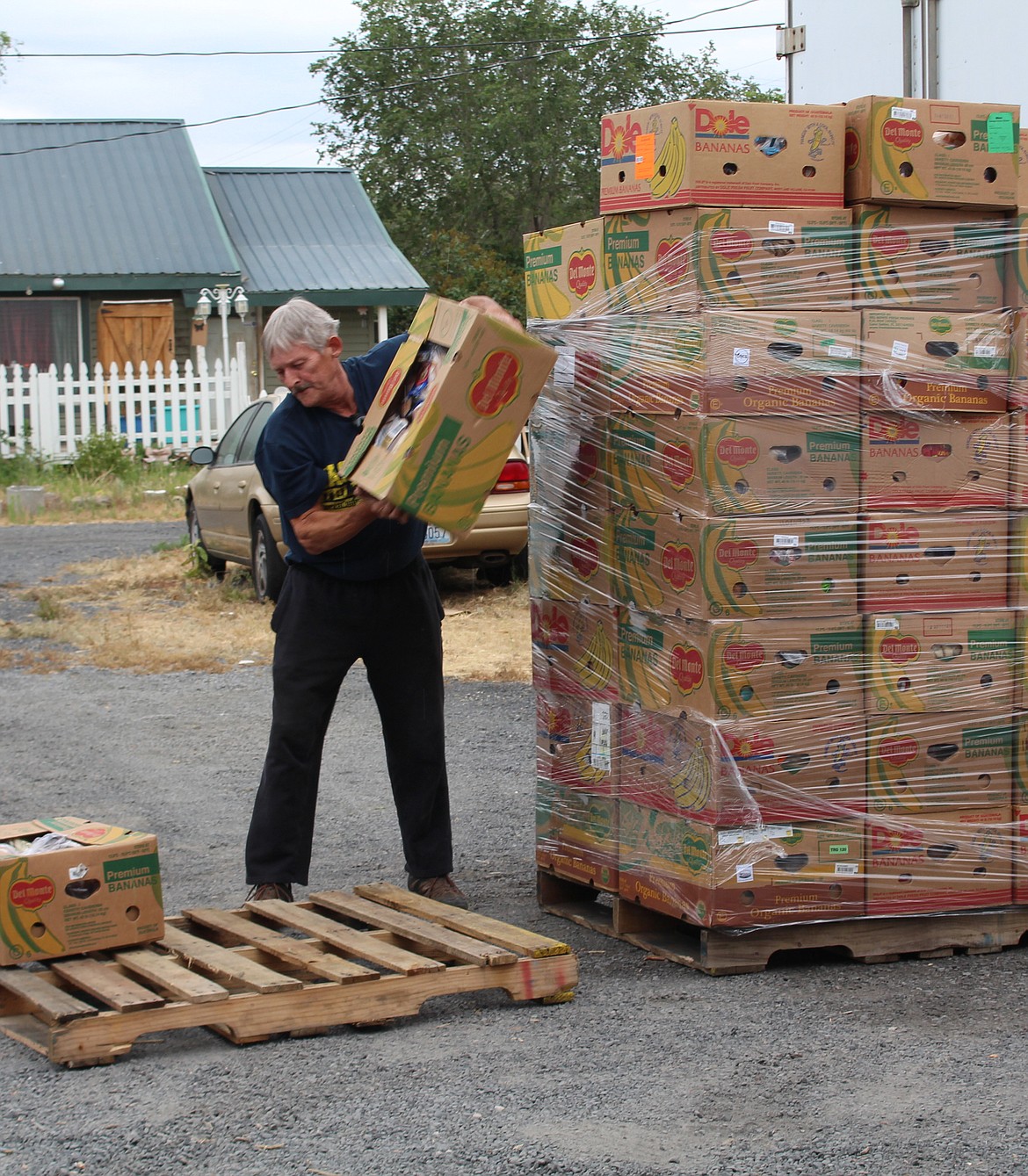 Steve Capella loads food for transport to the Soap Lake Food Bank. The Moses Lake Food Bank serves as a distribution center for local food banks.