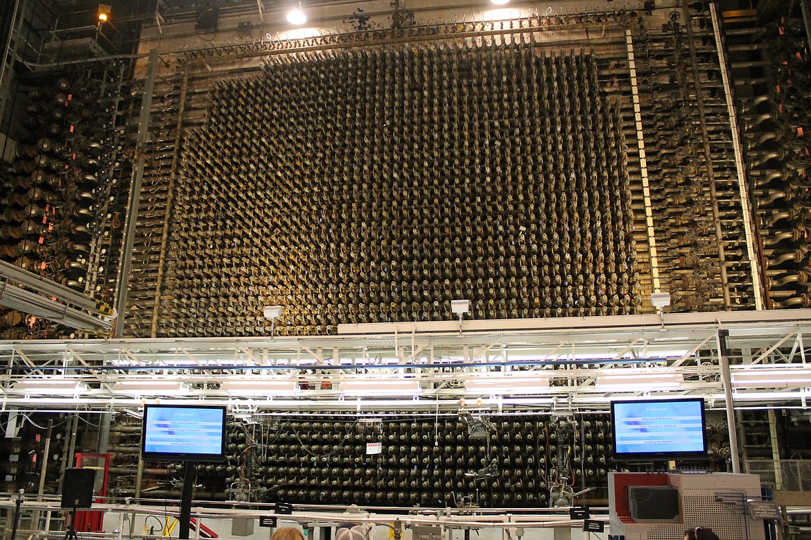 Visitors to the Hanford B Reactor get close up view of the front face of the reactor. This is where the fuel was loaded into the reactor.